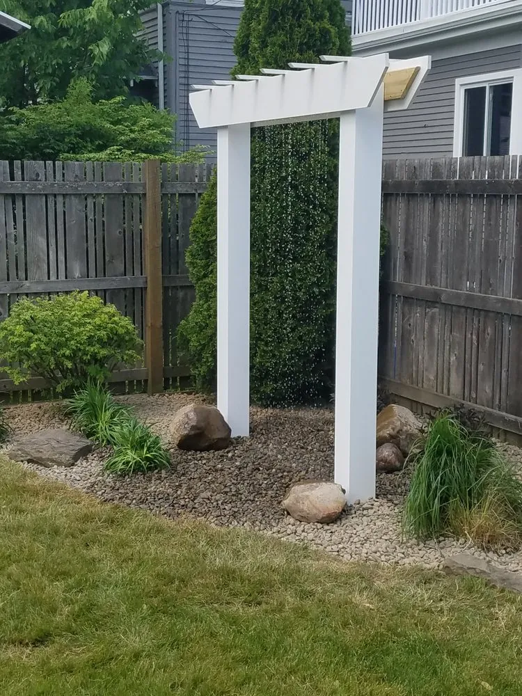 Affordable lawn mowing service for outdoor upgrades in Hamburg, NY by Oak Hill Professional Landscaping