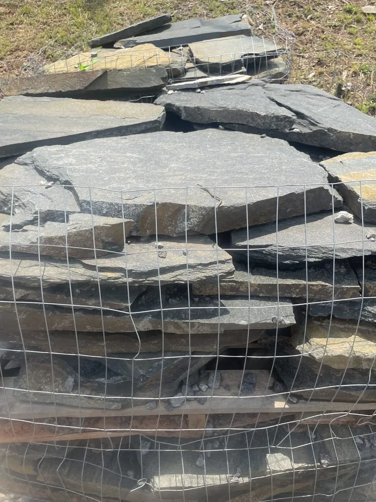 Expert lawn mowing service for year-round maintenance in Charlotte, NC by Oakhurst Landscaping and TreeSservice