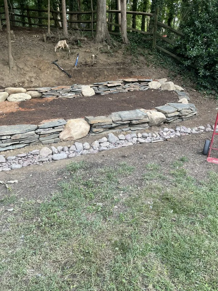 Professional yard cleanup service for outdoor upgrades in Charlotte, NC by Oakhurst Landscaping and TreeSservice