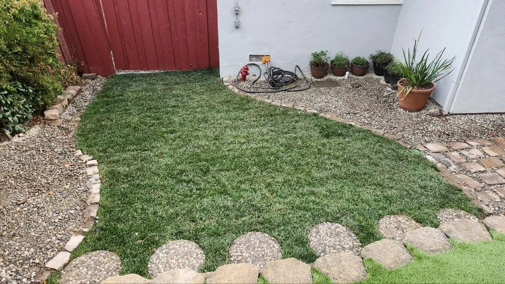 Custom lawn mowing service for homes in Redwood City, CA by Oakwood Landscaping