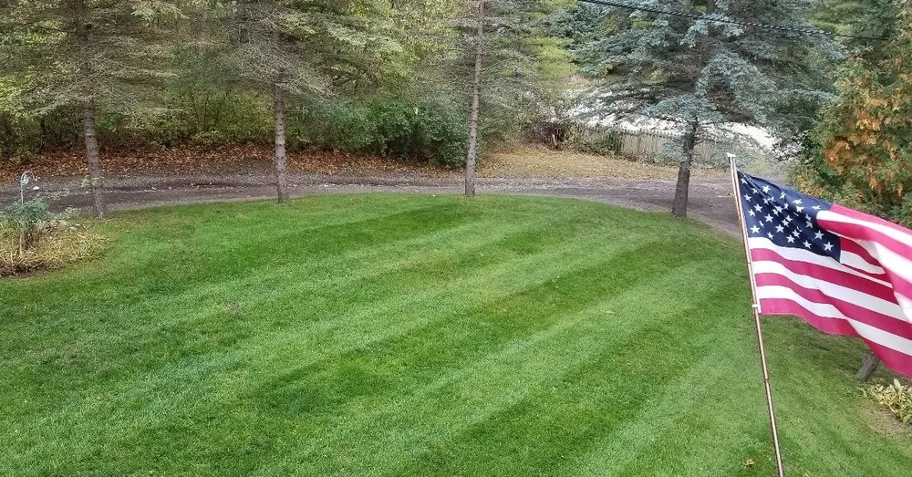 Custom landscape installation with custom design across Howell, MI - Oakwood Lawn Maintenance