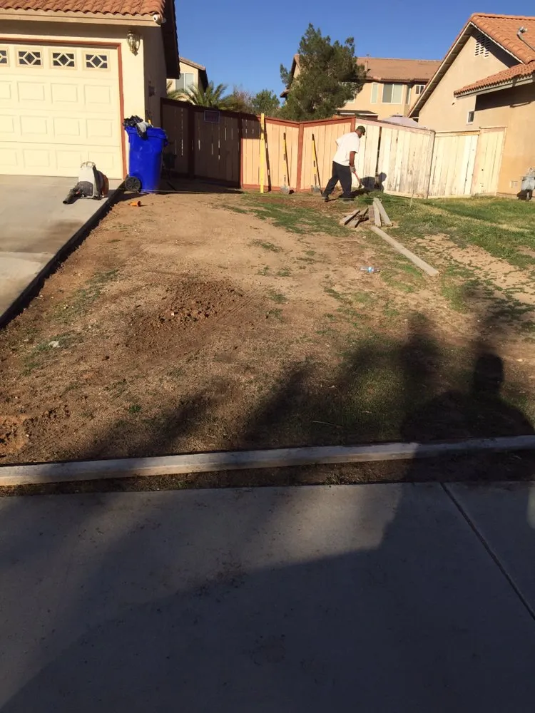 Professional lawn care service for homes across Victorville, CA - Oasis Custom Curbing And Landscaping