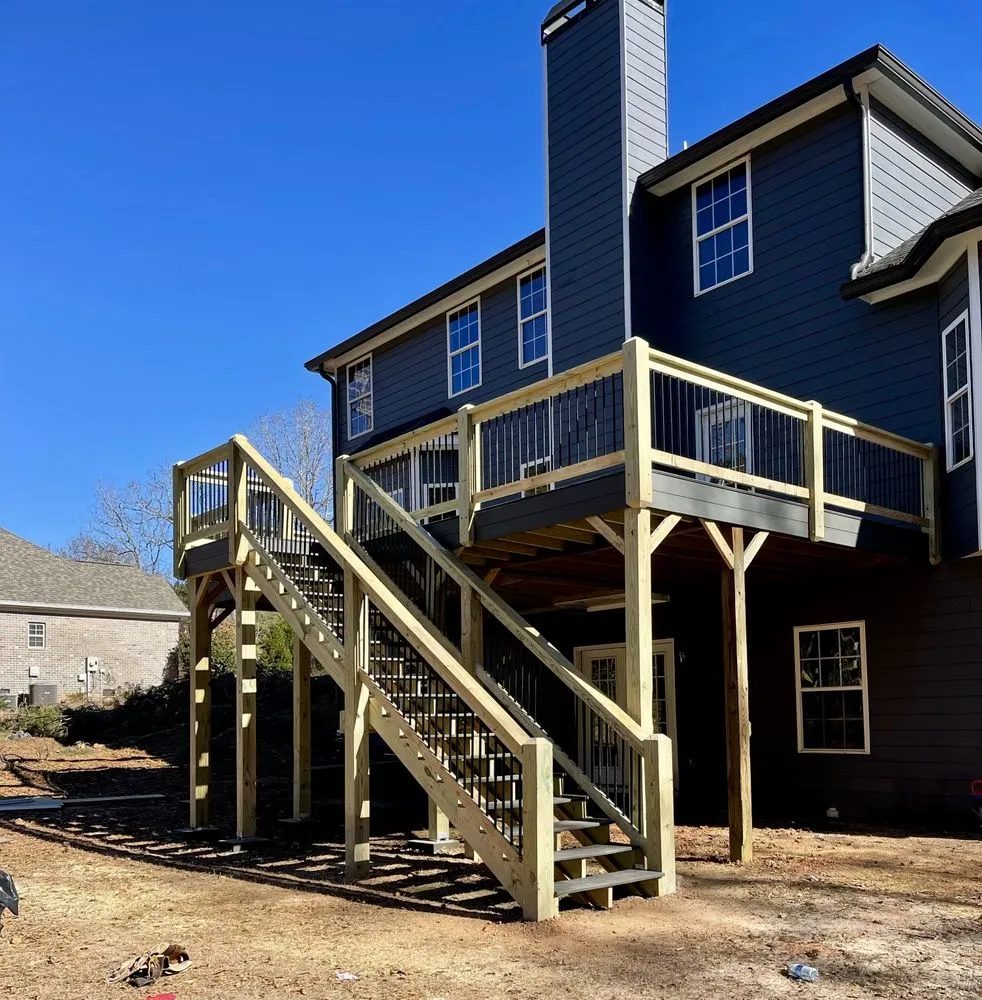 Professional yard cleanup service for beautiful yards in Woodstock, GA by OASIS General Contracting & Landscaping