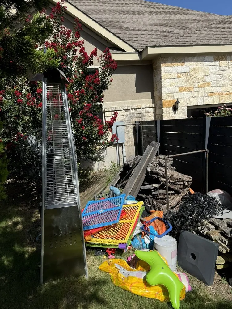 Affordable yard cleanup service with custom design in Buda, TX by Oasis Landscaping & Fencing