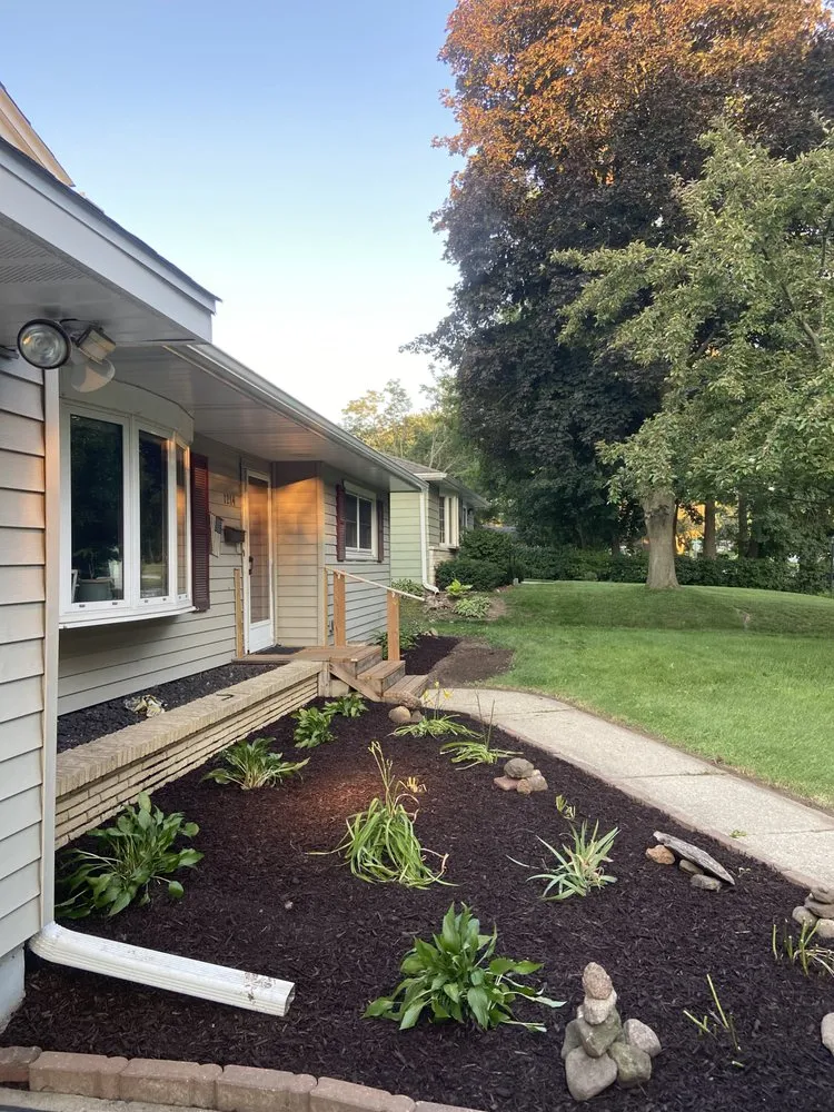 Custom garden landscaping with custom design in waukesh, WI by Oasis Landscaping & Lawncare