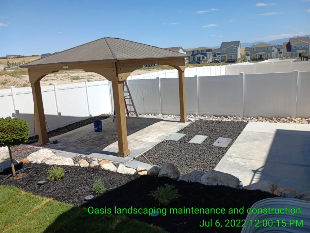 Custom lawn care service with custom design across Sandy, UT - Oasis Landscaping and Construction