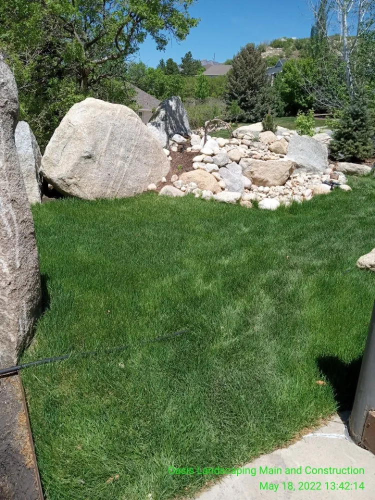 Custom outdoor landscaping in Sandy, UT by Oasis Landscaping and Construction