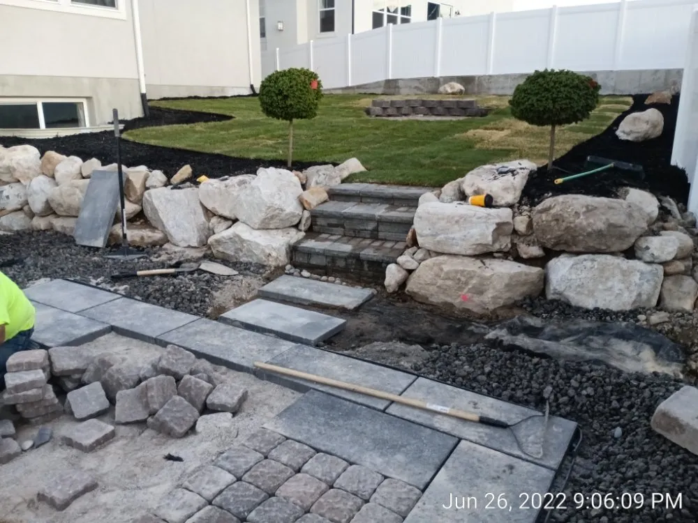 Affordable yard maintenance for residential properties across Sandy, UT - Oasis Landscaping and Construction
