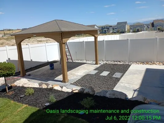 Oasis Landscaping and Construction Logo