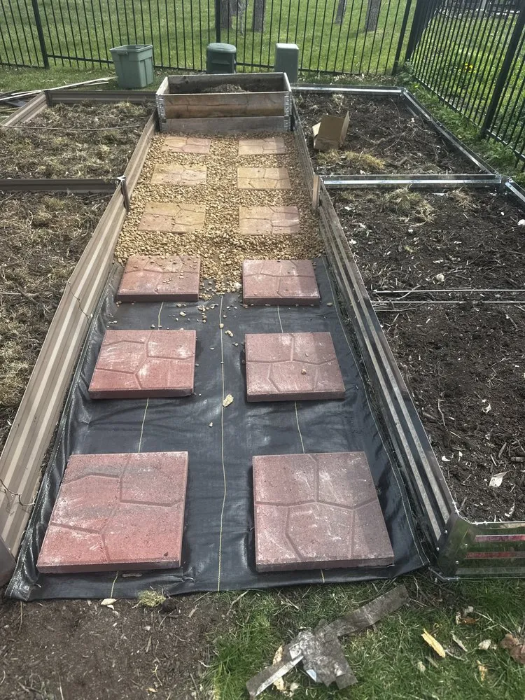 Affordable yard cleanup service for residential properties in Overland Park, KS by Oasis Landscaping