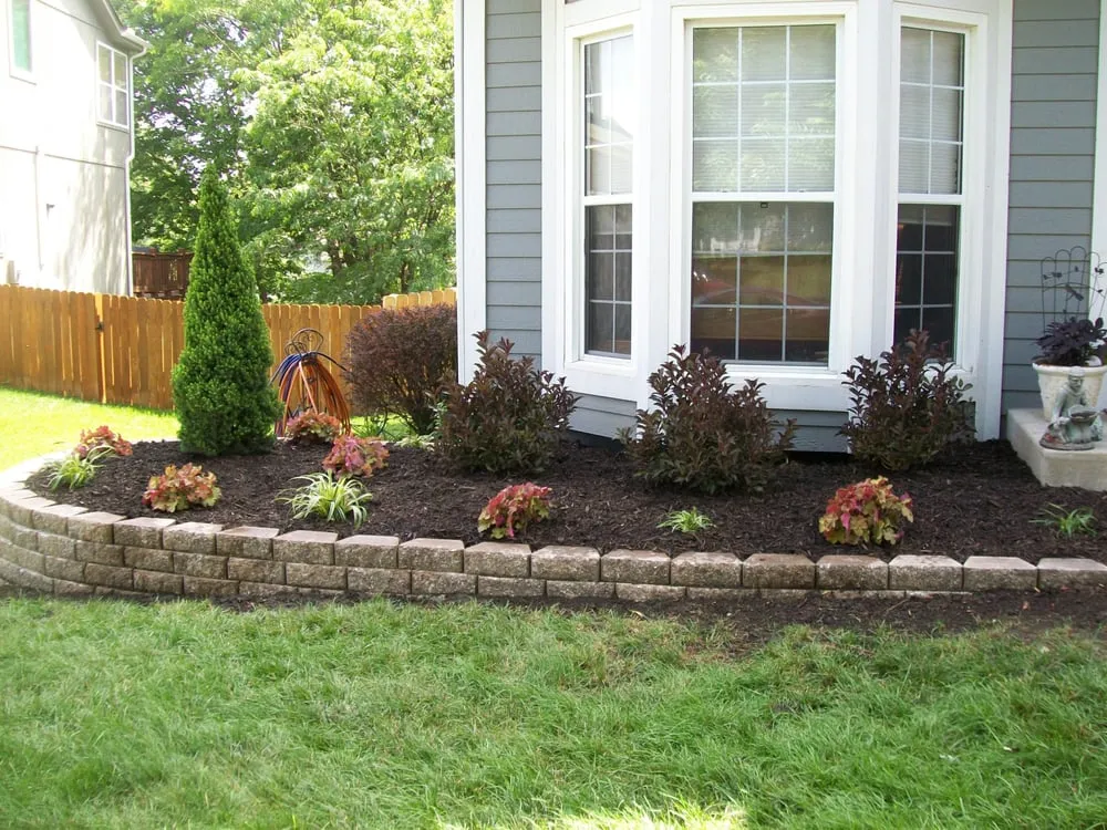 Professional landscape design in Louisburg, KS by Oasis Lawn Care