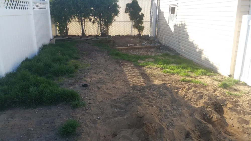 Professional yard cleanup service in Newton, NJ by Oasis Lawn Care