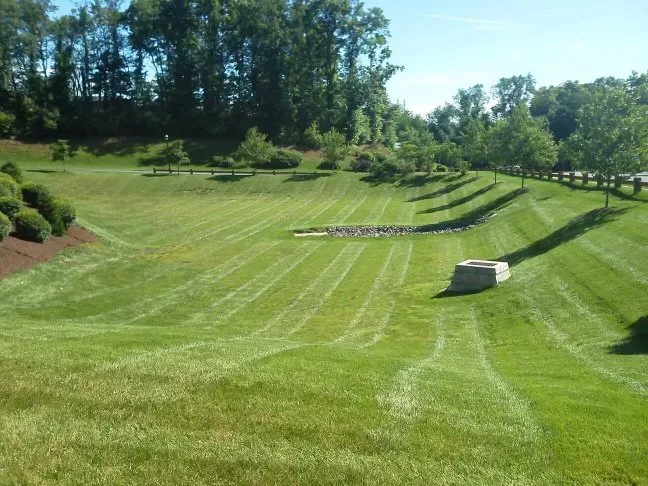 Custom landscape design with custom design across Wallingford, CT - Oasis Lawn Care