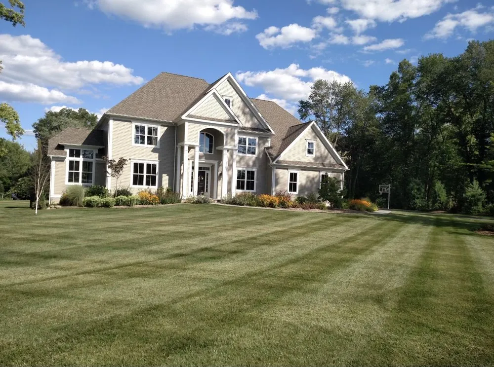 Expert landscape installation for residential properties in Wallingford, CT by Oasis Lawn Care
