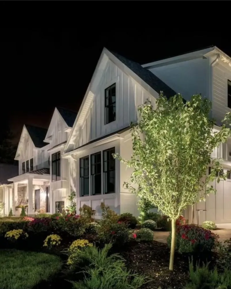 Expert lawn mowing service for residential properties in Huntington, NY by Oasis Lighting Design