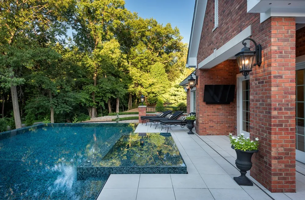 Expert outdoor landscaping with custom design in Wood River, IL by Oasis Pools