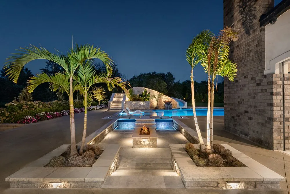 Professional lawn mowing service with custom design across Wood River, IL - Oasis Pools