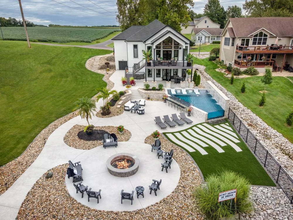 Professional landscape installation for homes in Wood River, IL by Oasis Pools