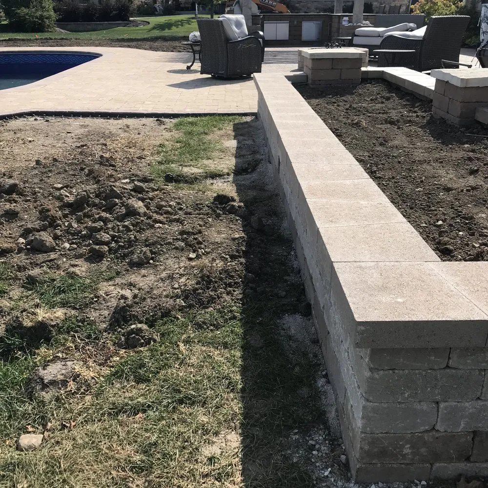Custom outdoor landscaping in Muskego, WI by Oasis Property Pros