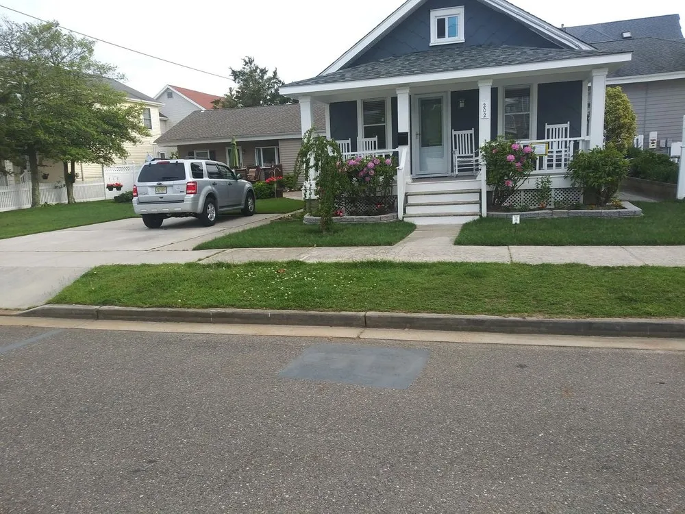 Top-rated lawn mowing service with custom design across Cape May, NJ - Obi's Lawn Care & Tree Trimming