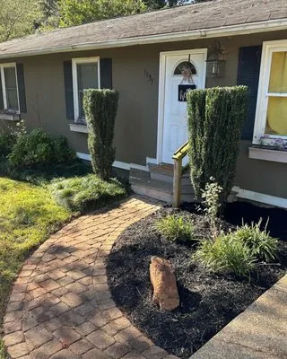 Oconee Roots Lawn Care Logo