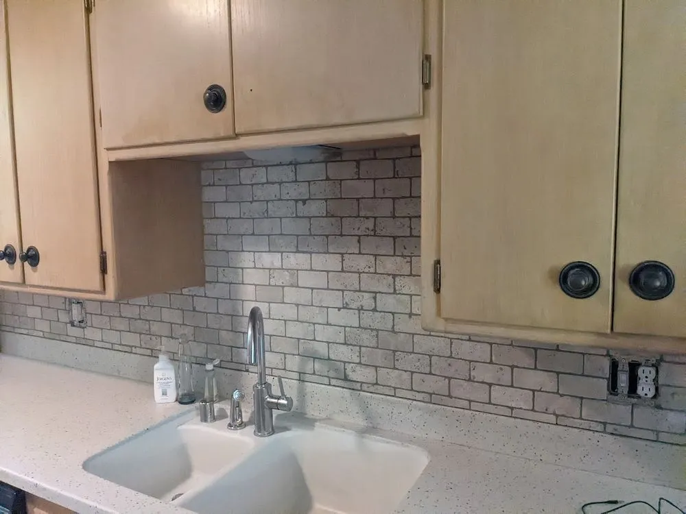 Top-rated yard cleanup service for residential properties in Milwaukee, WI by Odd Job Todd