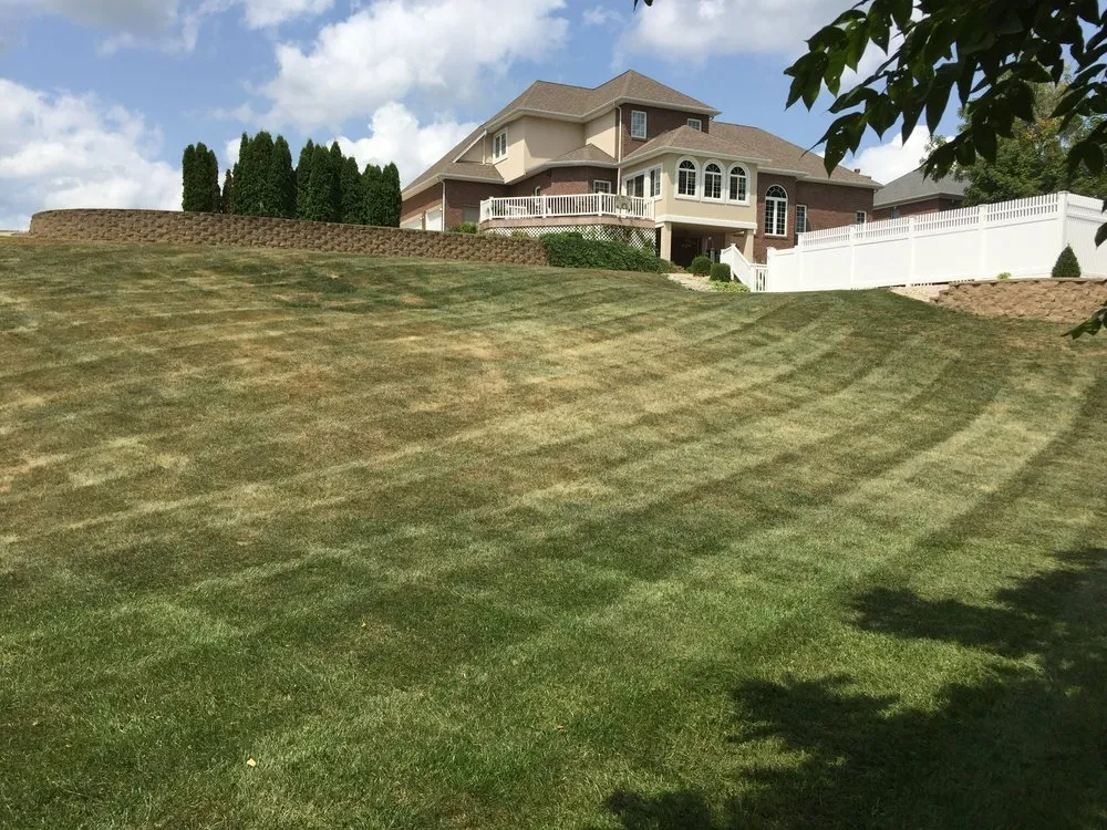 Custom lawn mowing service with custom design in New Point, IN by Off Duty Lawn Care