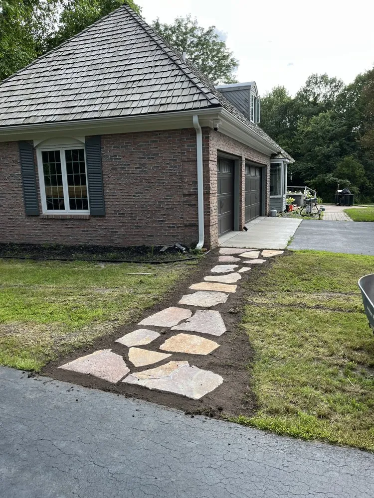 Custom landscaping services for year-round maintenance across Delano, MN - Oja Lawn & Landscape