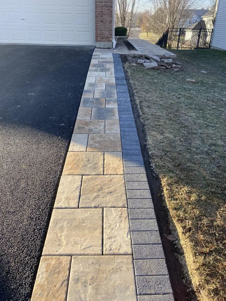 Custom landscape installation with custom design across Elgin, IL - Ojeda Service