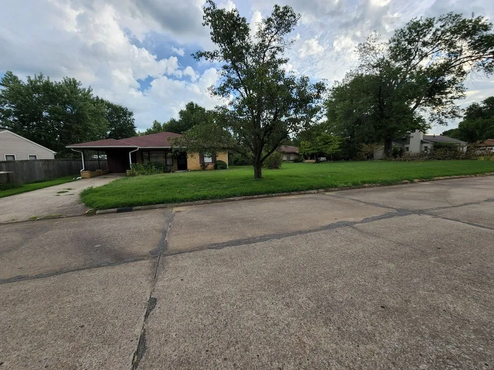 Trusted lawn mowing service for beautiful yards in Muskogee, OK by Okie's Lawn & Fence