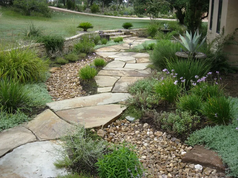 Custom garden landscaping in Kyle, TX by Ol' Yeller Landscaping