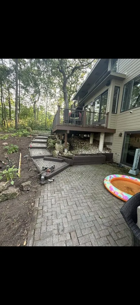 Professional landscape installation in East Troy, WI by Old Crow Construction