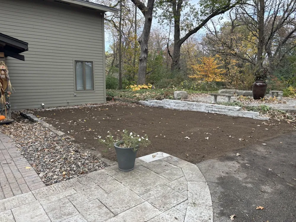 Professional lawn mowing service in East Troy, WI by Old Crow Construction