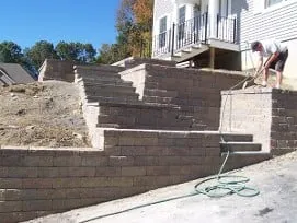 Affordable lawn care service for year-round maintenance across Sutton, MA - Old Farm Landscaping