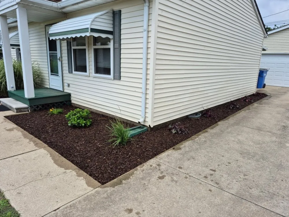 Professional yard maintenance for residential properties in Monroe, MI by Old Town Landscape