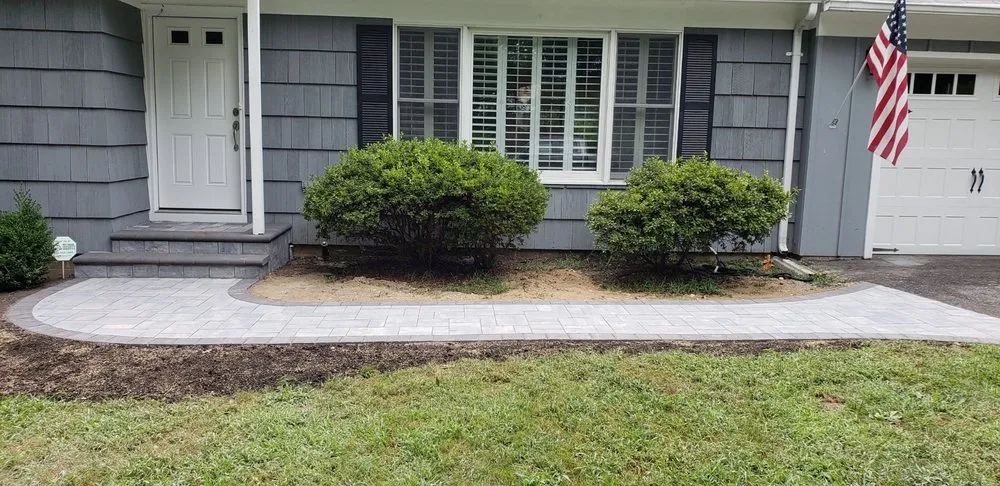 Affordable yard maintenance for year-round maintenance in Stony Brook, NY by Old Town Landscaping & Design