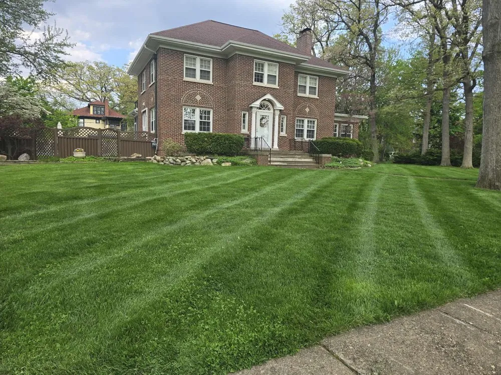 Expert lawn mowing service for homes in Owosso, MI by Oldhams Lawncare
