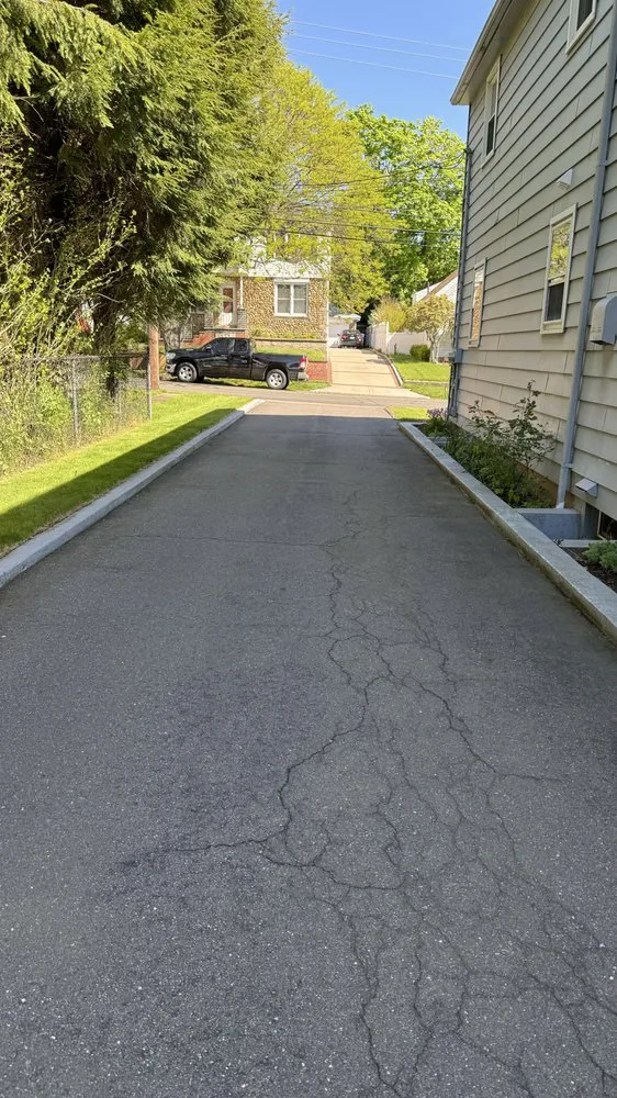 Local yard cleanup service for residential properties in New Britain, CT by Olive Creek Landscaping