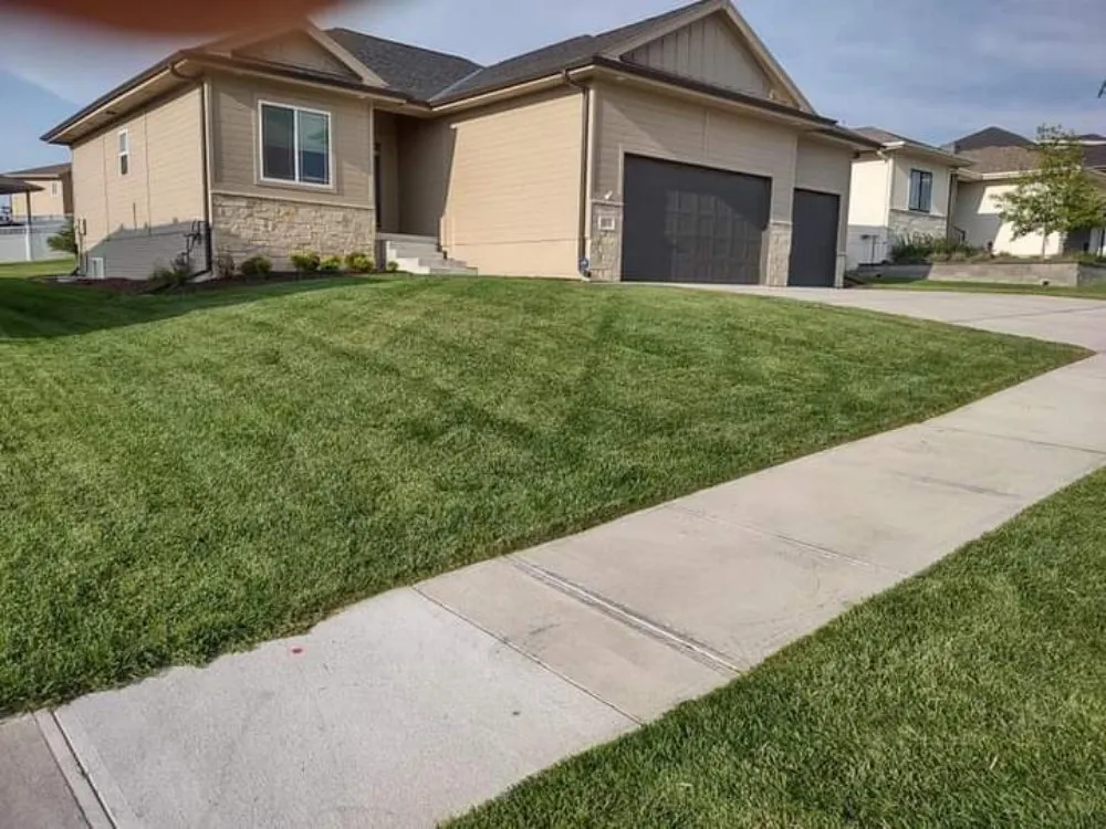 Reliable residential landscaping for year-round maintenance in Omaha, NE by Ollie's Lawn Care