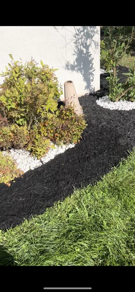 Custom garden landscaping for residential properties in Bedford, VA by Olsons Family Lawn Care