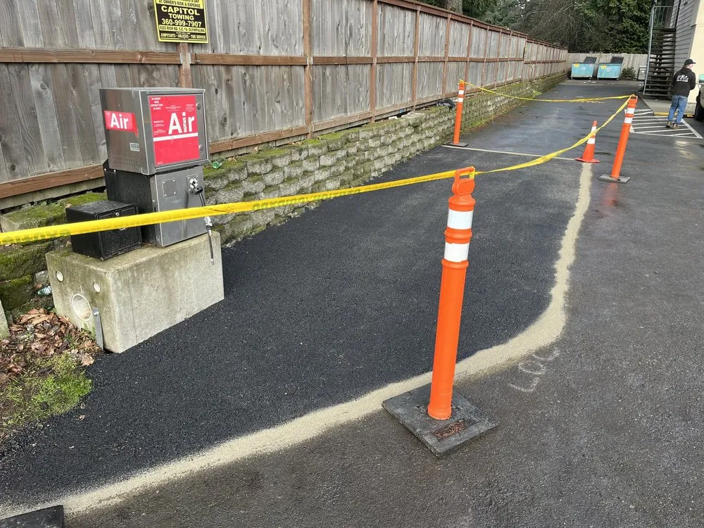 Affordable lawn care service in East Olympia, WA by Olympia Construction & Development