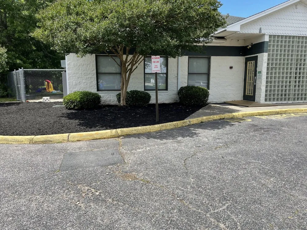 Expert lawn mowing service for homes in Portsmouth, VA by Olympic Land & Lawn