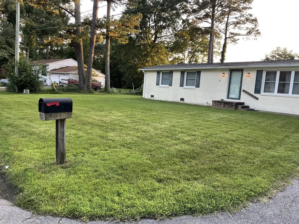 Trusted lawn mowing service for residential properties in Portsmouth, VA by Olympic Land & Lawn