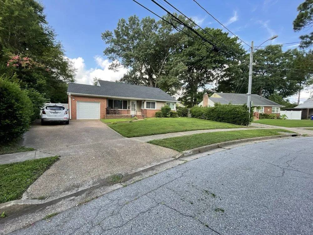 Custom landscape installation in Portsmouth, VA by Olympic Land & Lawn