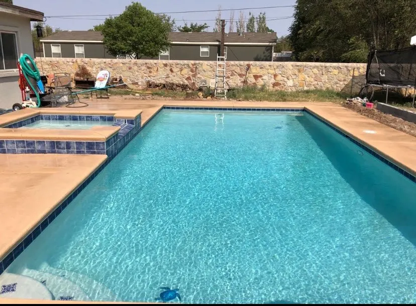 Professional lawn mowing service for residential properties in El paso, TX by Olympic Pools & Landscaping