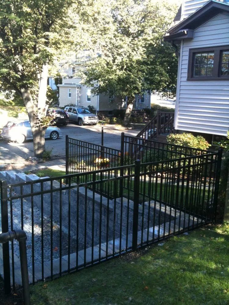Expert yard cleanup service for homes across Weymouth, MA - OMA Fence