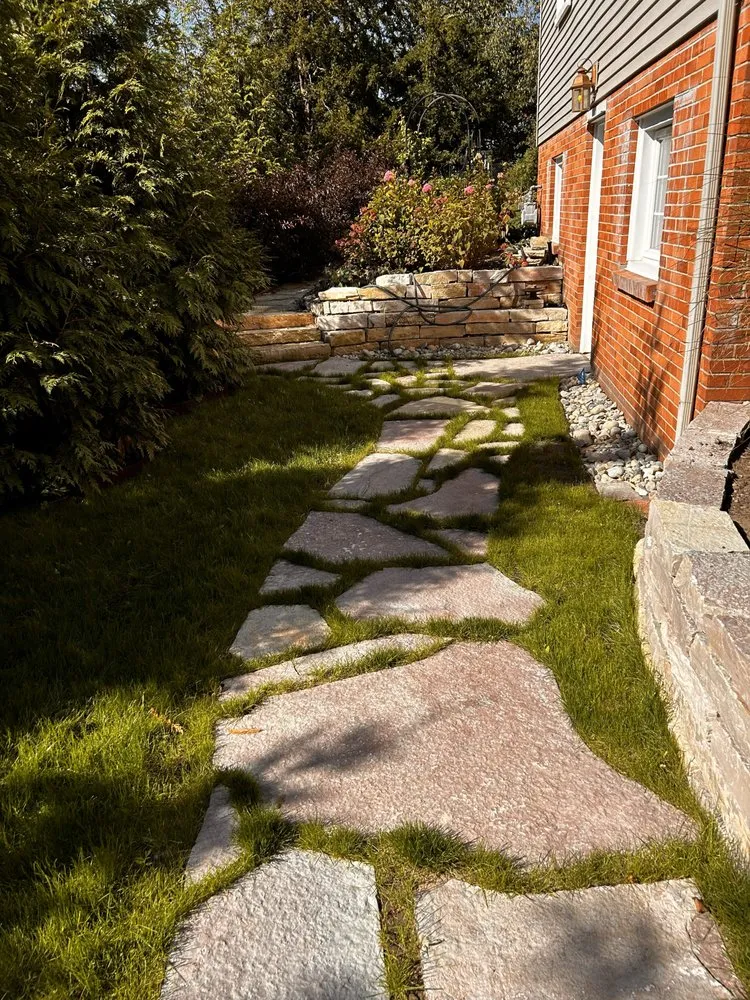 Trusted outdoor landscaping for homes across East Grand Rapids, MI - Omega Brick & Landscaping