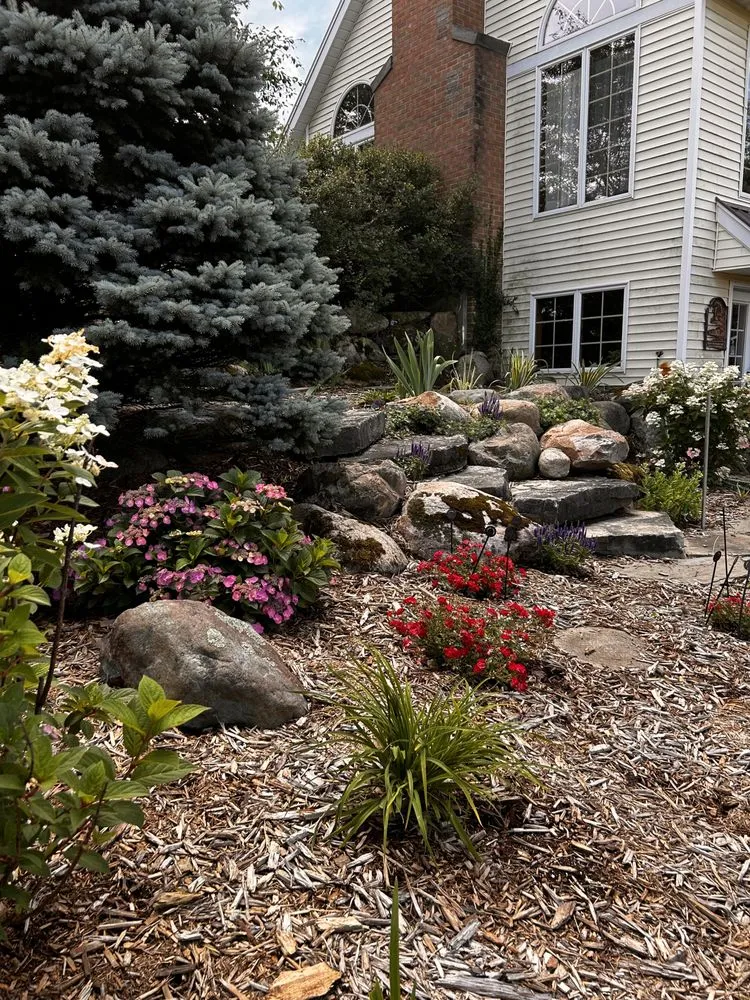 Expert garden landscaping for year-round maintenance across East Grand Rapids, MI - Omega Brick & Landscaping