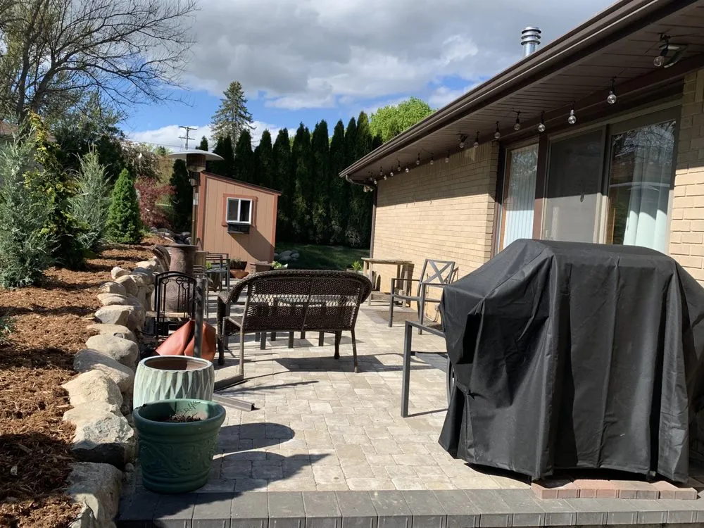 Reliable lawn care service in East Grand Rapids, MI by Omega Brick & Landscaping