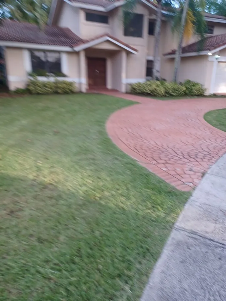 Affordable lawn mowing service for homes in Miami, FL by Omgl Affordable Lawn Services